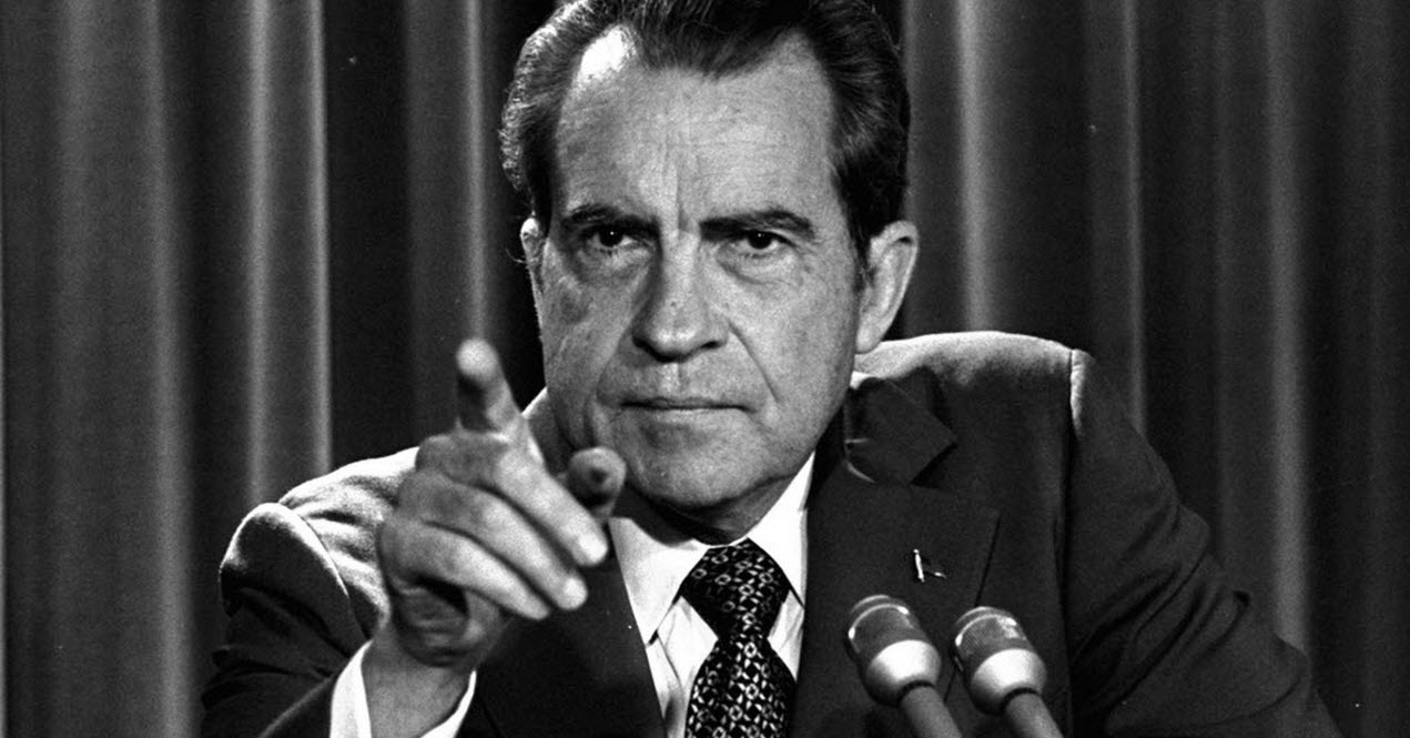 Black and white image of Richard Nixon pointing