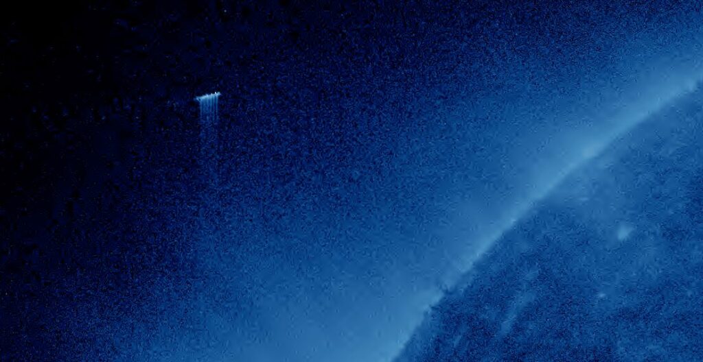 UFO with light beam caught near Sun? Or Equipment glitch?