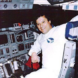 Clark McLelland sits on the Space Shuttle (Picture NASA)