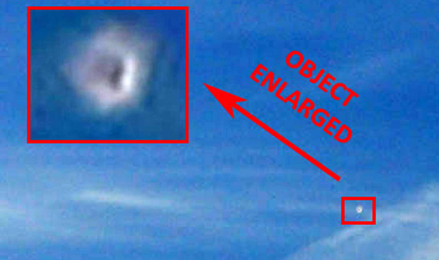 A Man Saw & Took Photo of White UFO Near Contrail