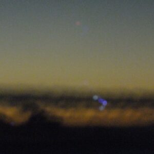 Horrible photo, zoomed in and as a result blurred up and erratic from camera shake and lack of light. Shows the lights (predominantly blue)