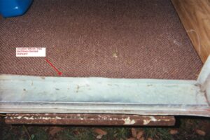 Photo of trim and location where it had been previously dented.