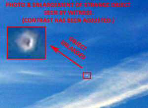 A Man Saw & Took Photo of White UFO Near Contrail