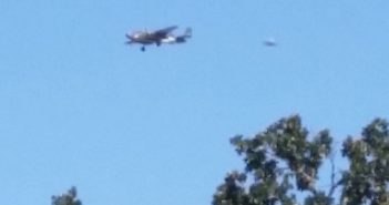 UFO buzzed a vintage B-25 Mitchell bomber as it approached for landing in Santa Margarita, CA