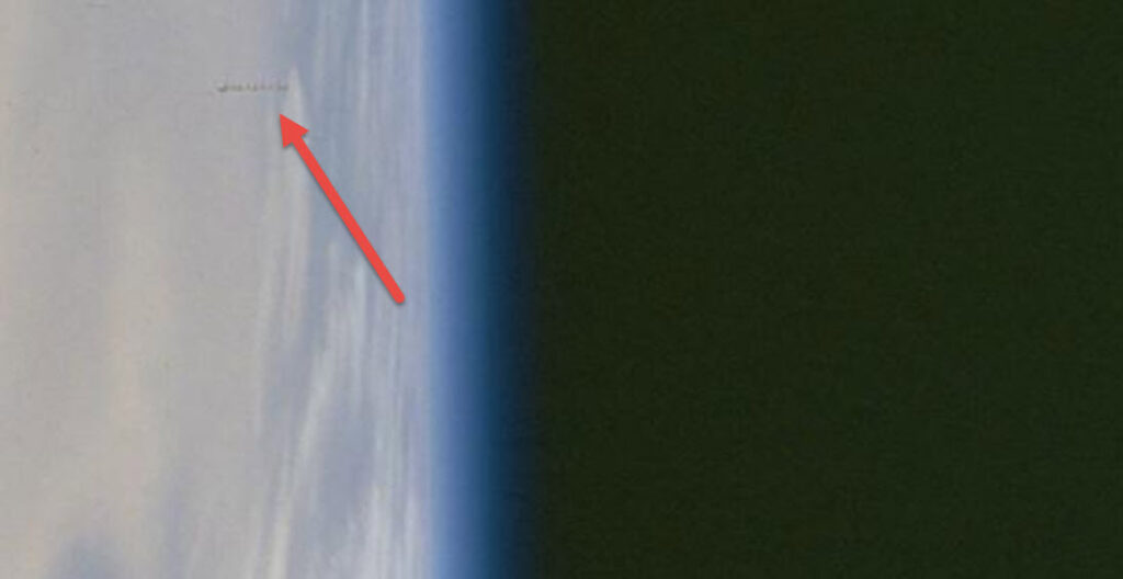 Unexplained Formation of Objects on NASA Photograph from Space Shuttle STS-100